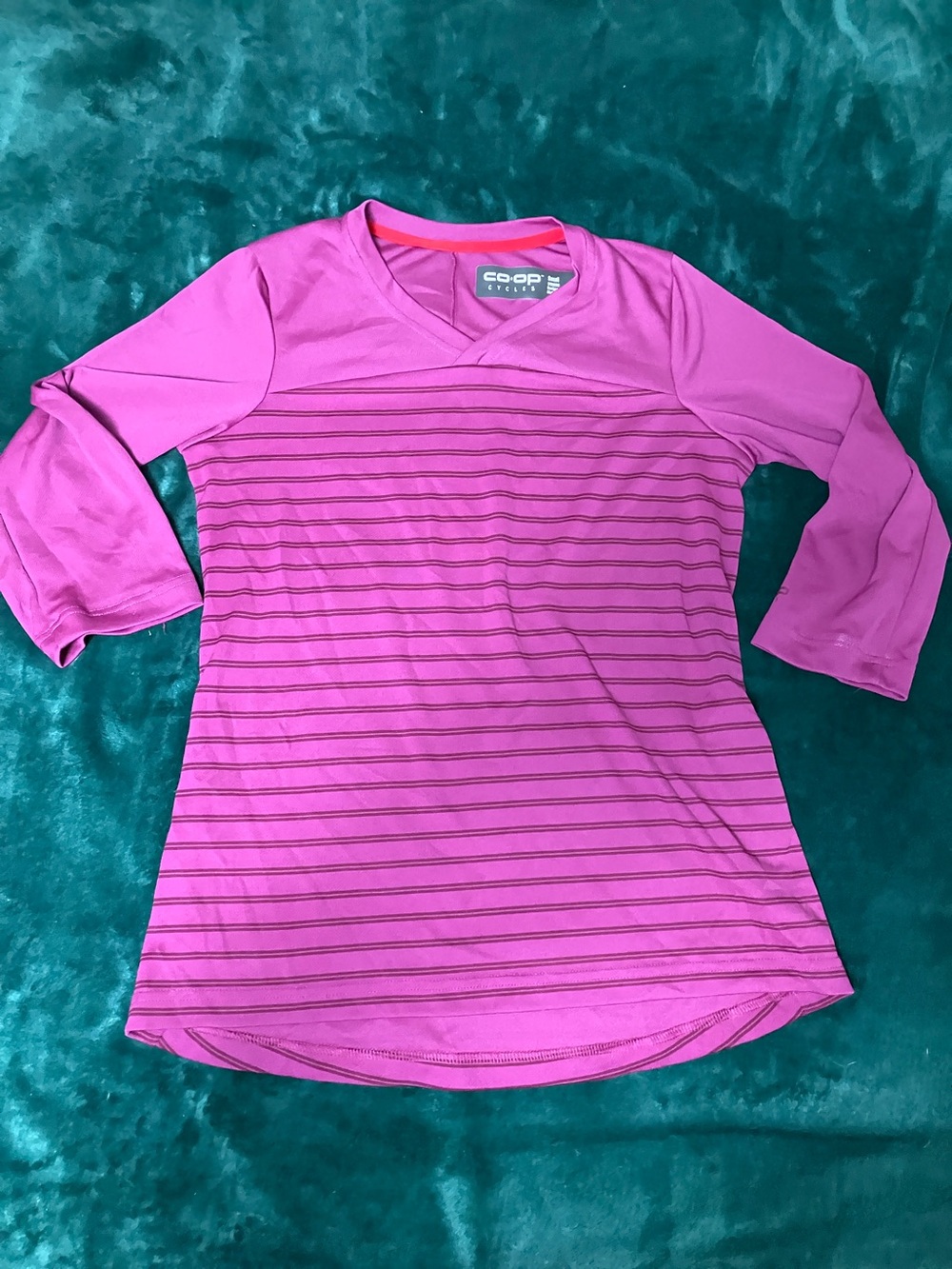 REI Co-op Bike brand. Women’s mtn bike jersey